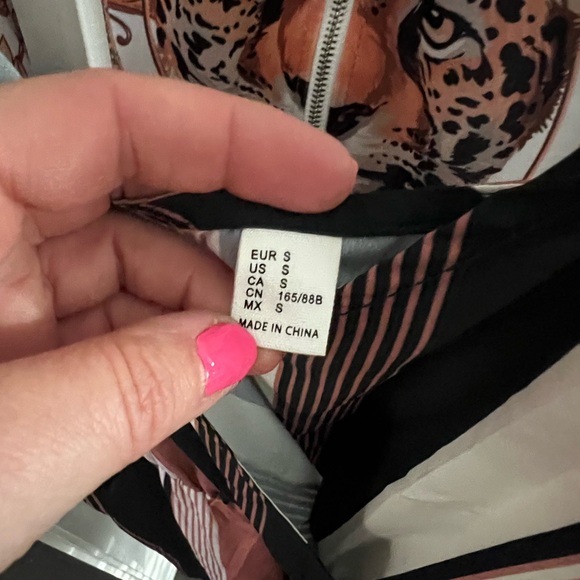 Never worn—size small. Short romper with tie - Picture 2 of 2